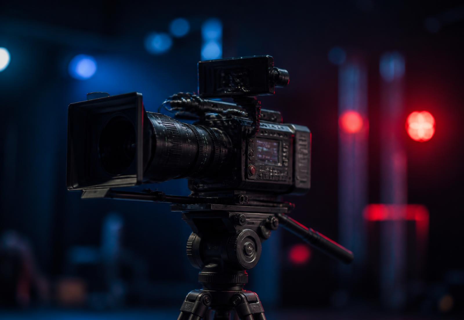 Professional cinema camera on a tripod in a studio